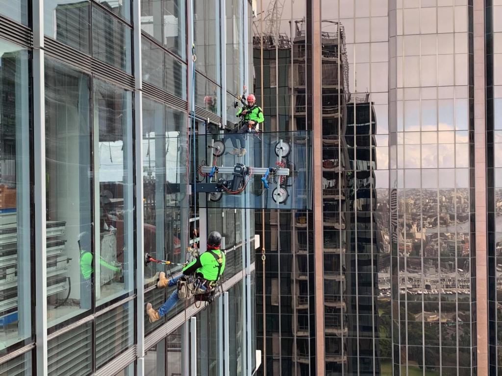 Two-men-cleaning-high-risejpg